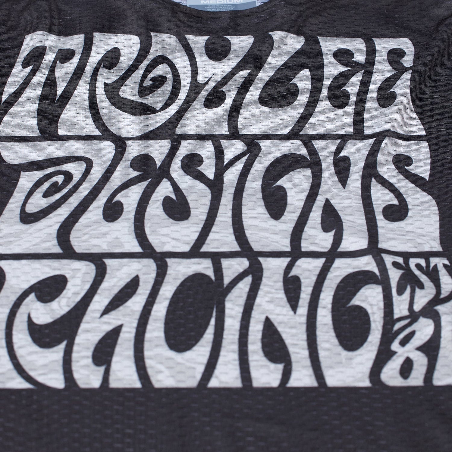 Maillot GP Pro Air 'Manic Monday' Juvenil Negro: Transpirable, Ligero, Alto Rendimiento