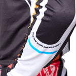 Maillot Troy Lee Designs SE Pro Wavez Negro/Multi: Transpirable, Duradero, Alto Rendimiento